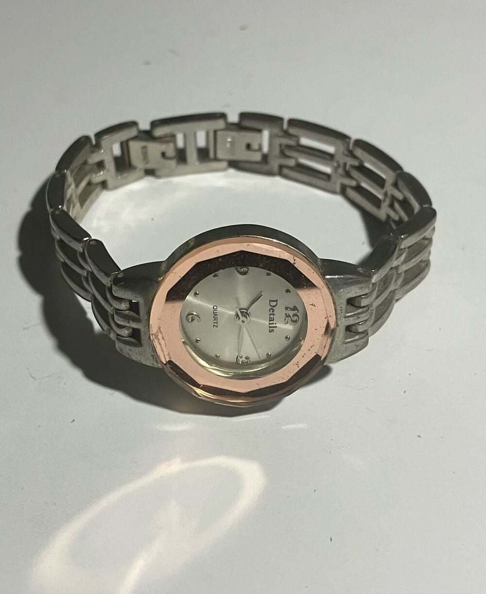 Details Quartz Women's Two-Tone Rose Gold and Silver Faceted Bezel Watch